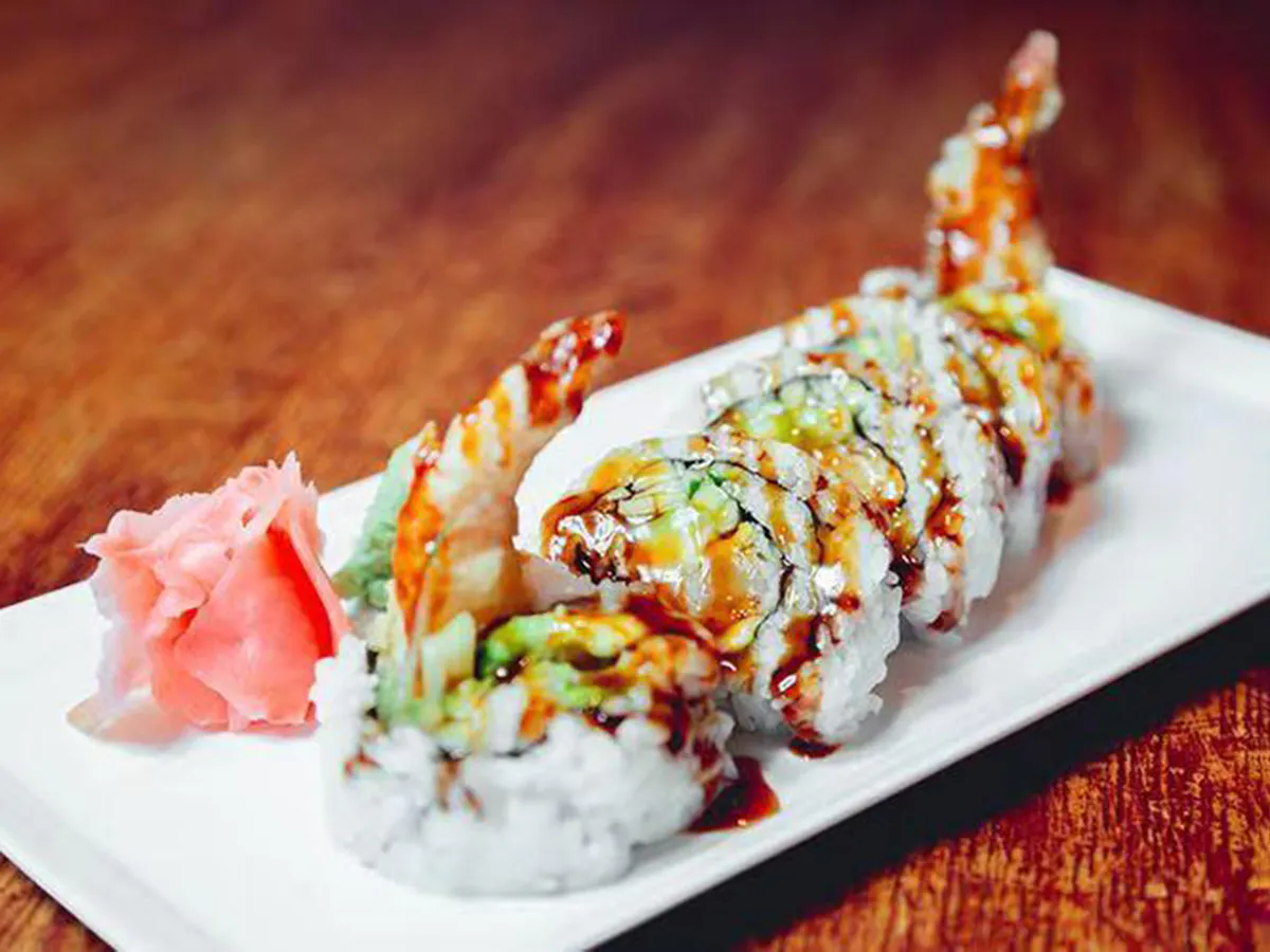 Shrimp tempura sushi roll with colorful toppings at Joy Chalet Cuisine, an Asian Restaurant in Warrington