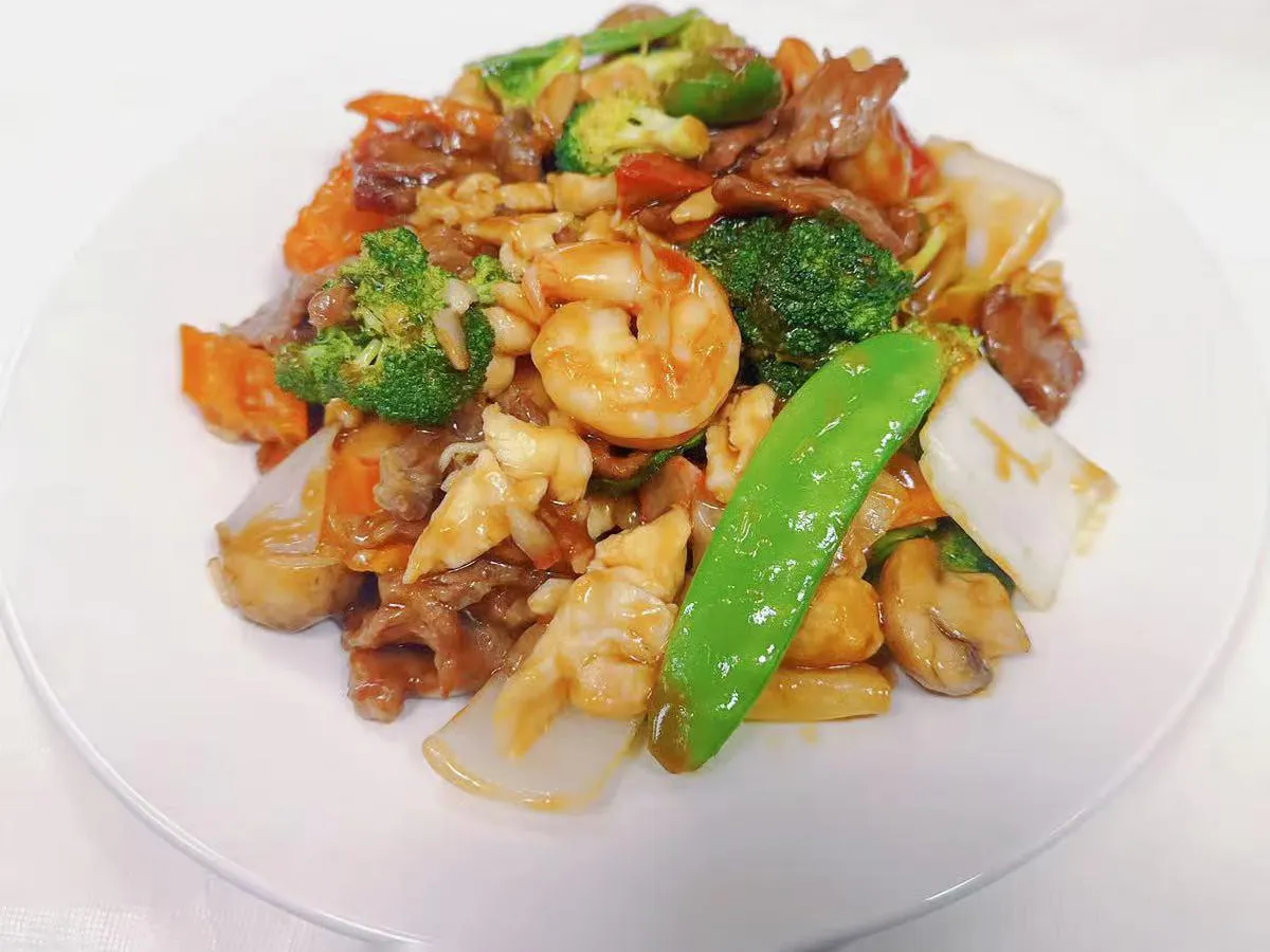 Triple delight stir-fry with shrimp chicken and veggies at Joy Chalet Cuisine, an Asian Restaurant in Warrington